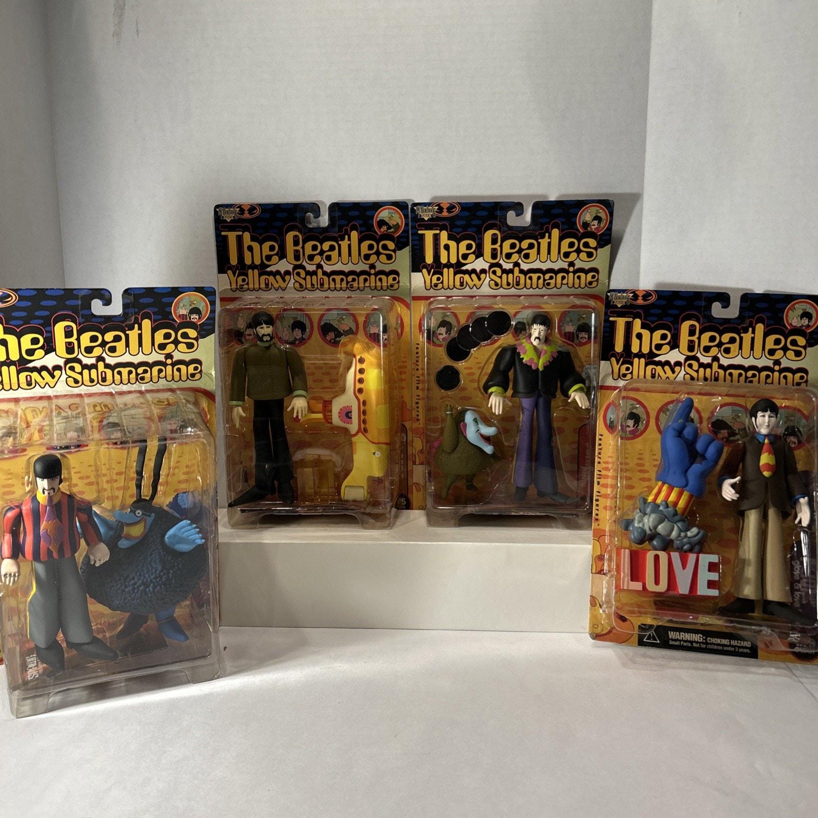 その他 the beatles yellow submarine figure set The Beatles Yellow Submarine Set of 4 Action Figures 1999