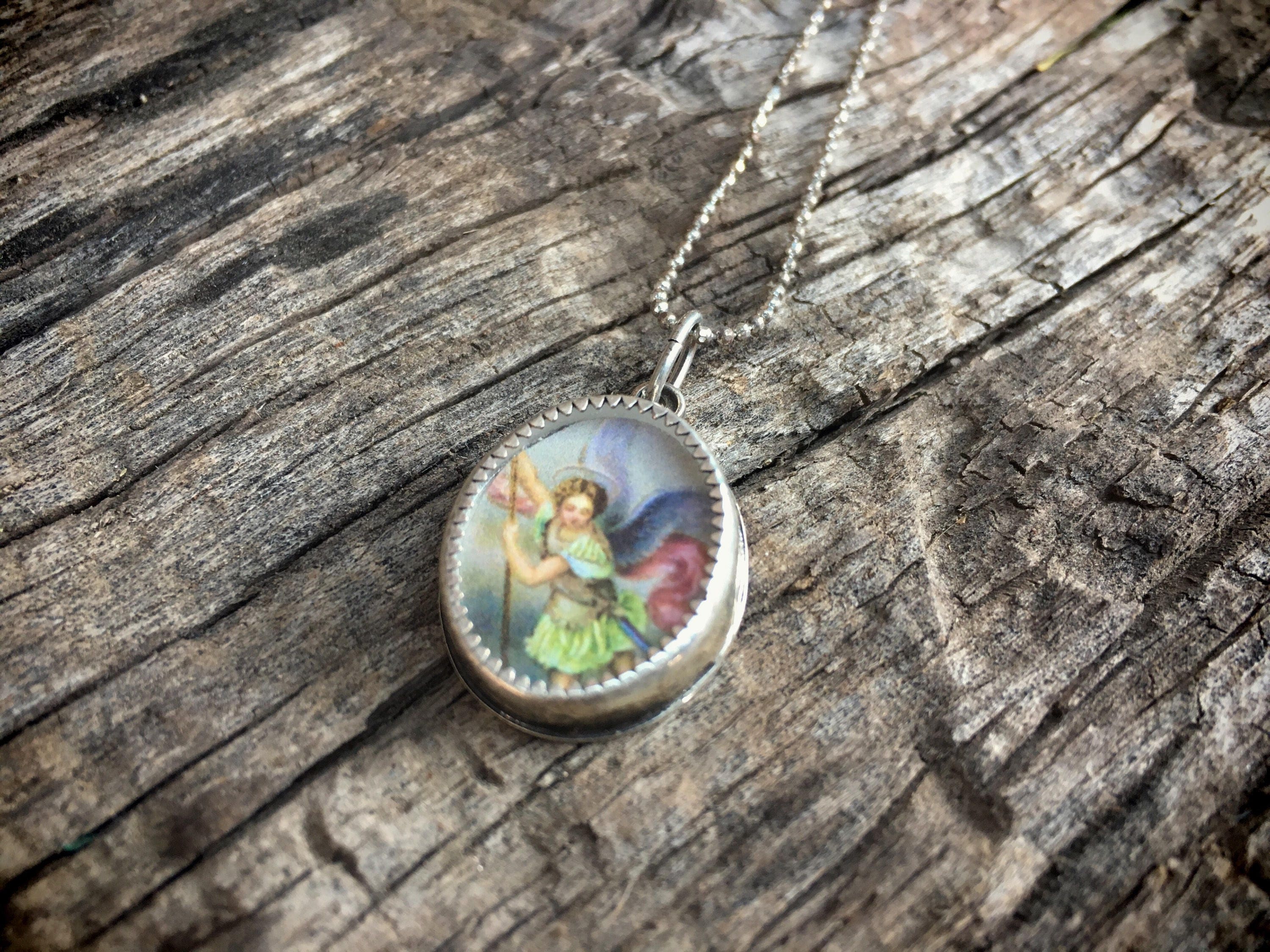 Archangel Michael Encased in Silver with Glass Reliquary Pendant