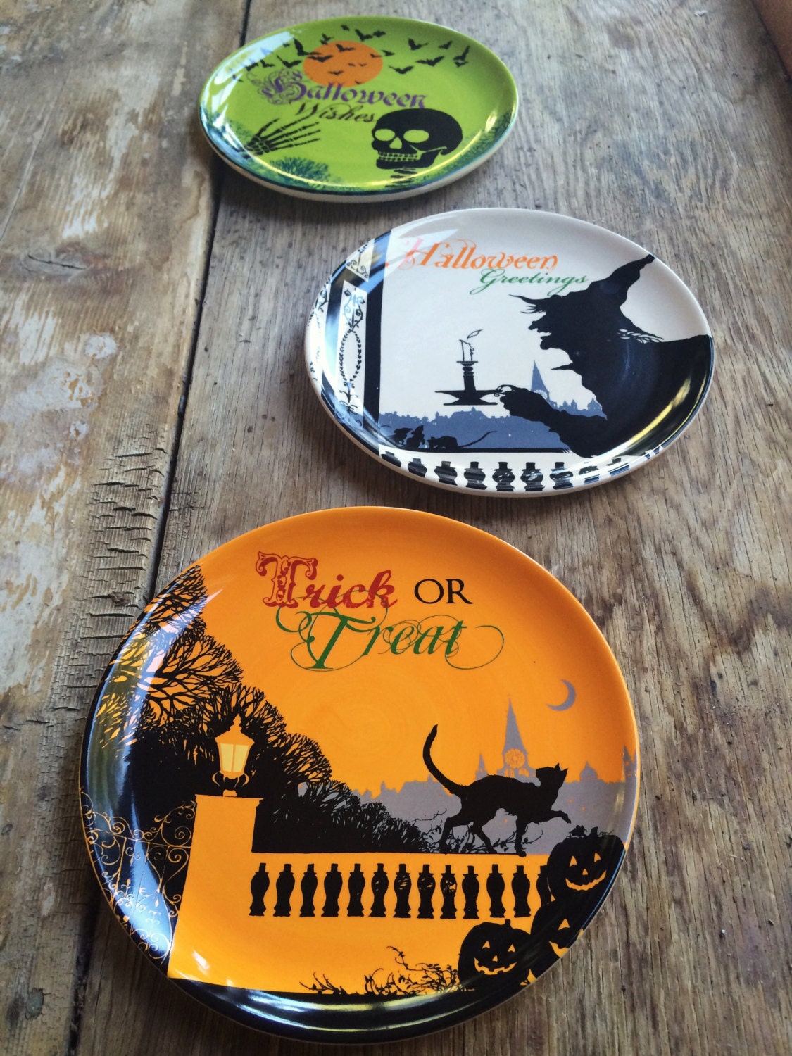 Vintage Halloween plates with witches Trick or Treat skeleton Halloween