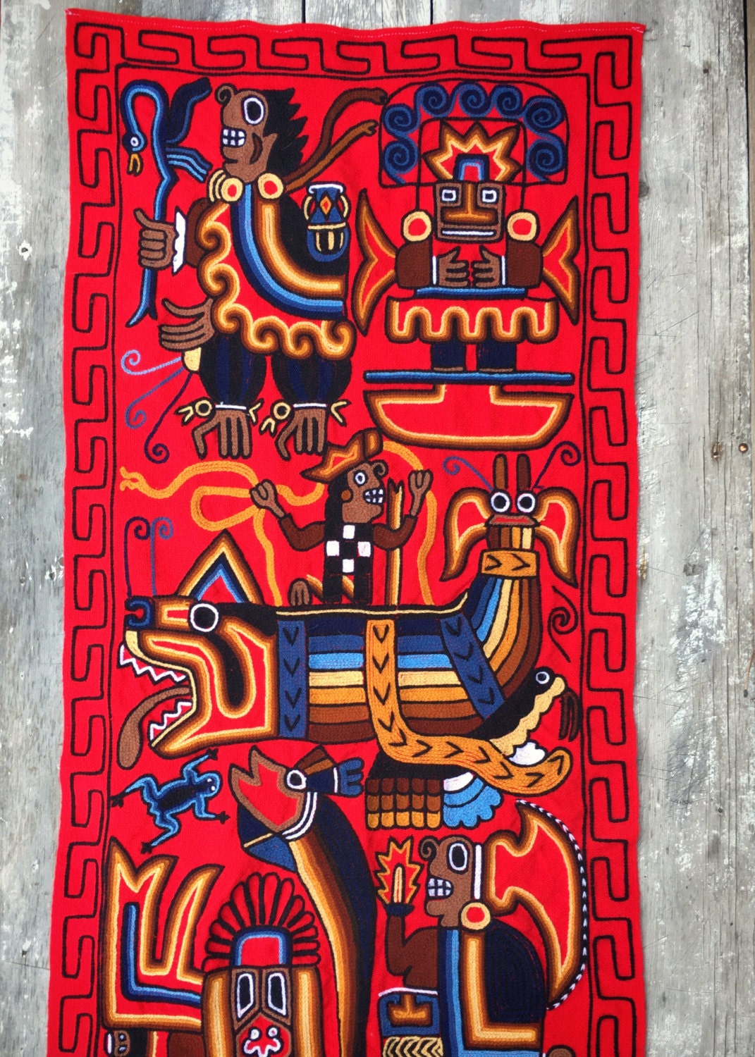 Vintage 22 x 45 Huichol embroidered yarn Mexican wall hanging Aztec red