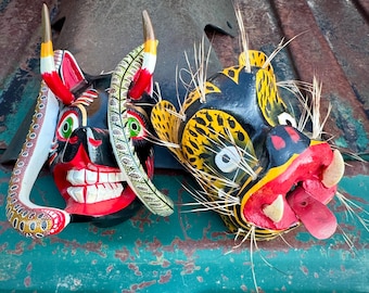 Pair of Small Carved Wood Mexico Masks, Jaguar 3" and Wolf w/ Snake 3.5"