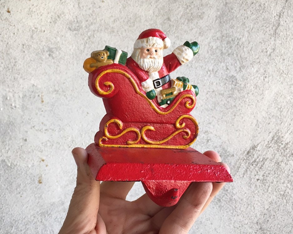 Three Small Cast Iron Santa Claus Christmas Stocking Holders for Mantle
