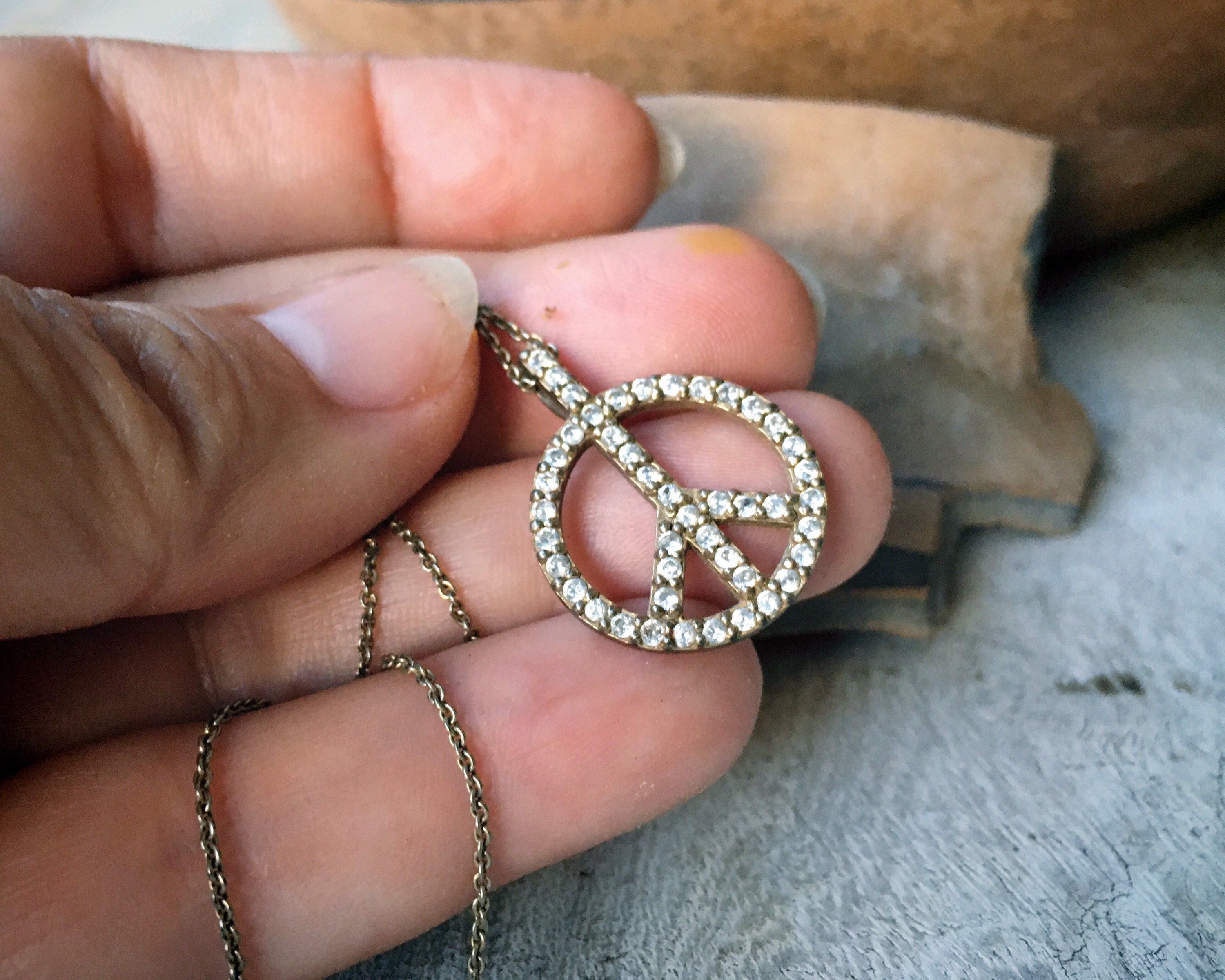 Diamond peace sign pendant new arrivals