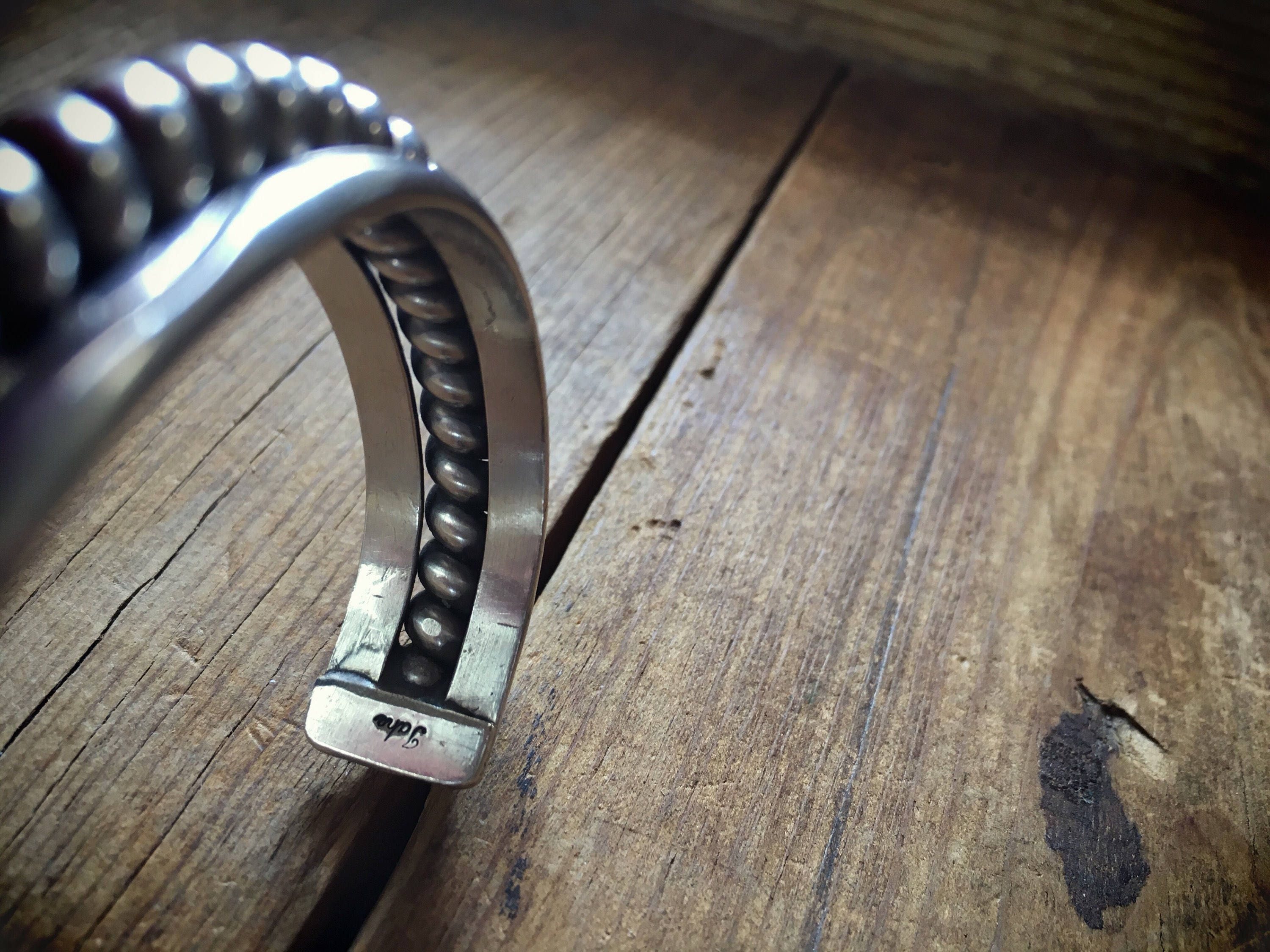 Vintage Navajo Nora Tahe half round silver cuff bracelet