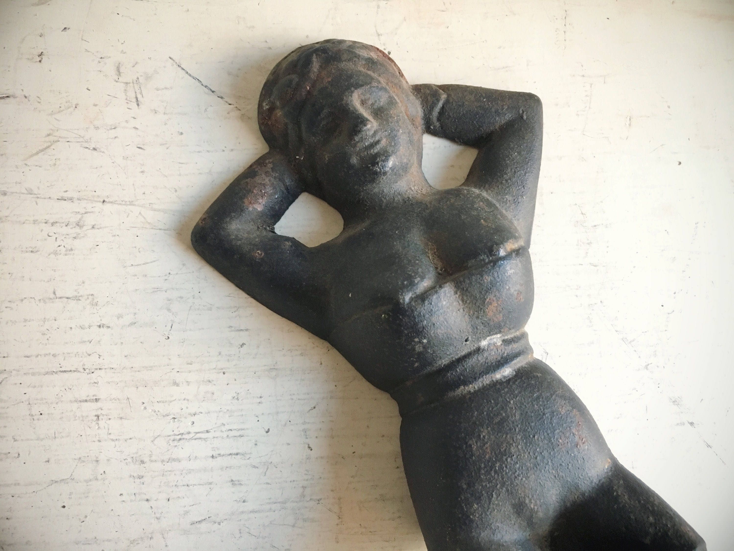 Vintage cast iron boot jack top