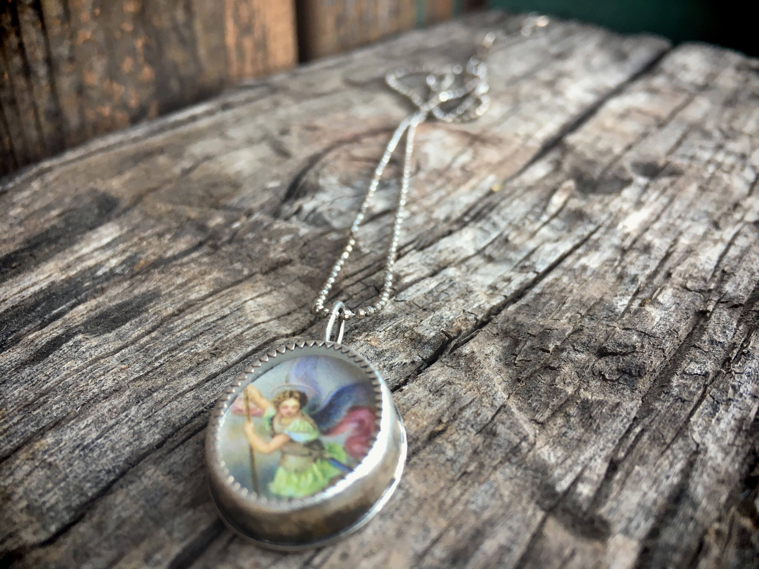 Archangel Michael Encased in Silver with Glass Reliquary Pendant