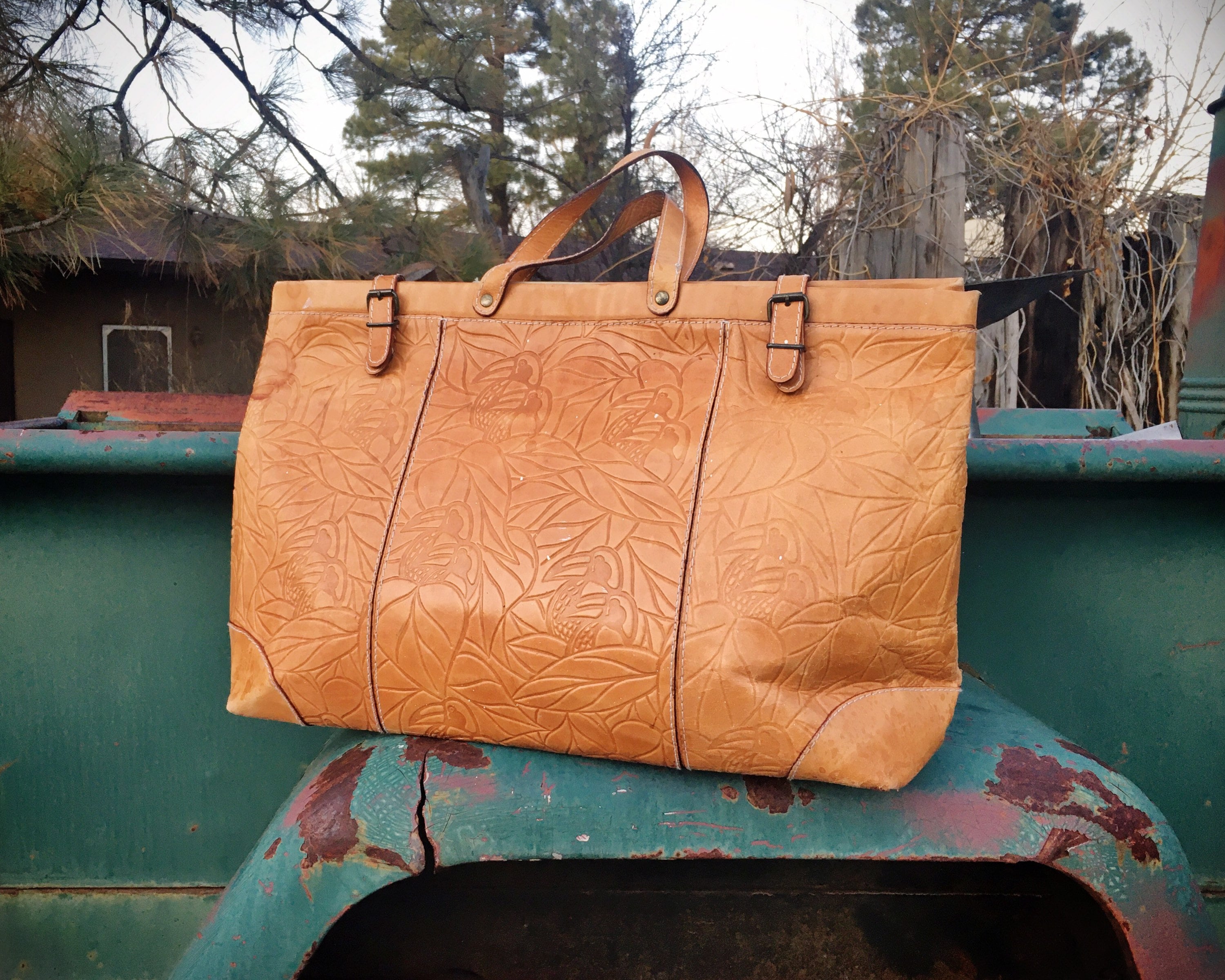 Embossed Leather Tote Bag with Velcro Closure and Fold Over Buckles