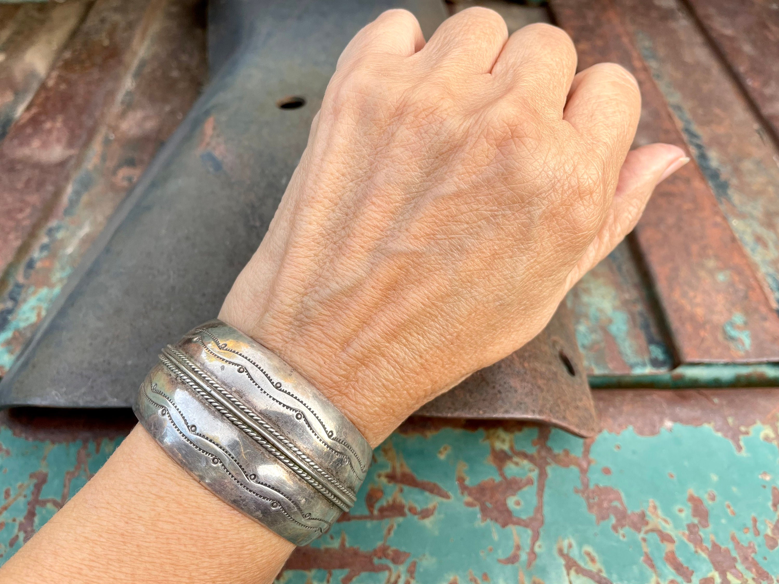 Item #913R- XLG Wide Navajo Stamped Symbols Repousse Sterling Silver Cuff  Bracelet by V&C Hale —Men's and Women's Sterling Silver and Gold Bracelets-  EAGLE ROCK TRADING POST-Native American Jewelry