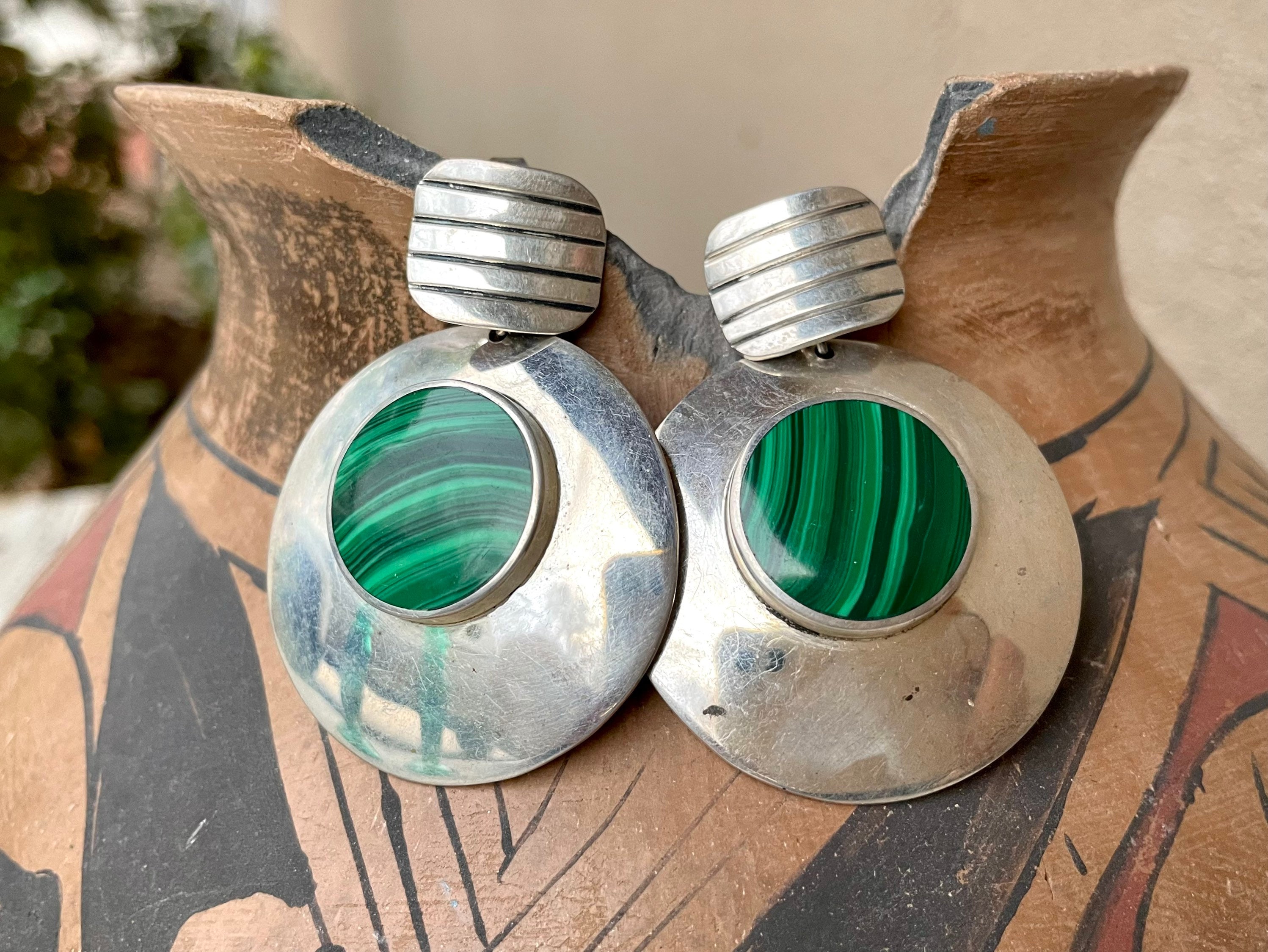 Big round silver earrings deals