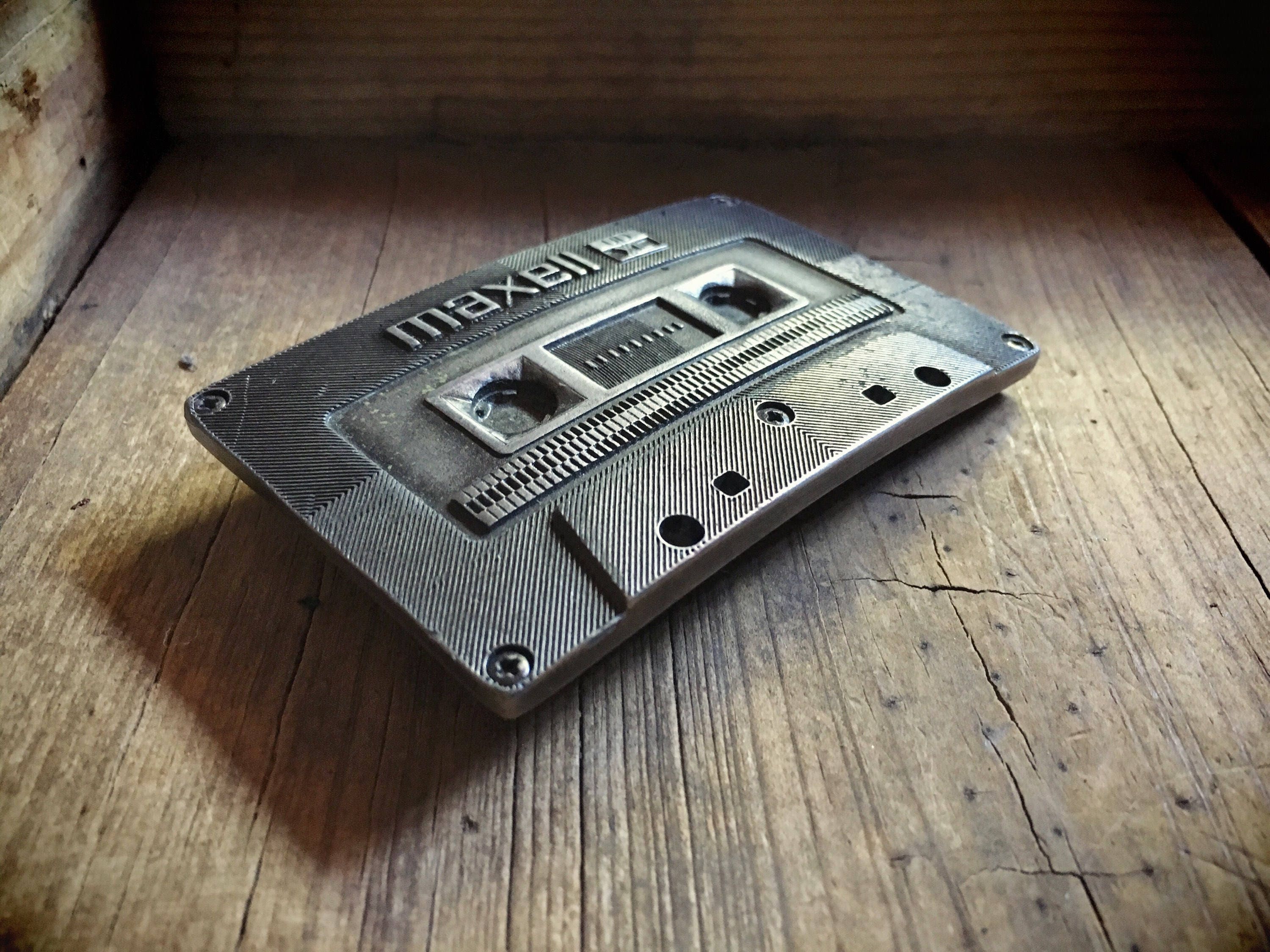 Vintage Maxell cassette tape belt buckle in silver tone metal, 1970s