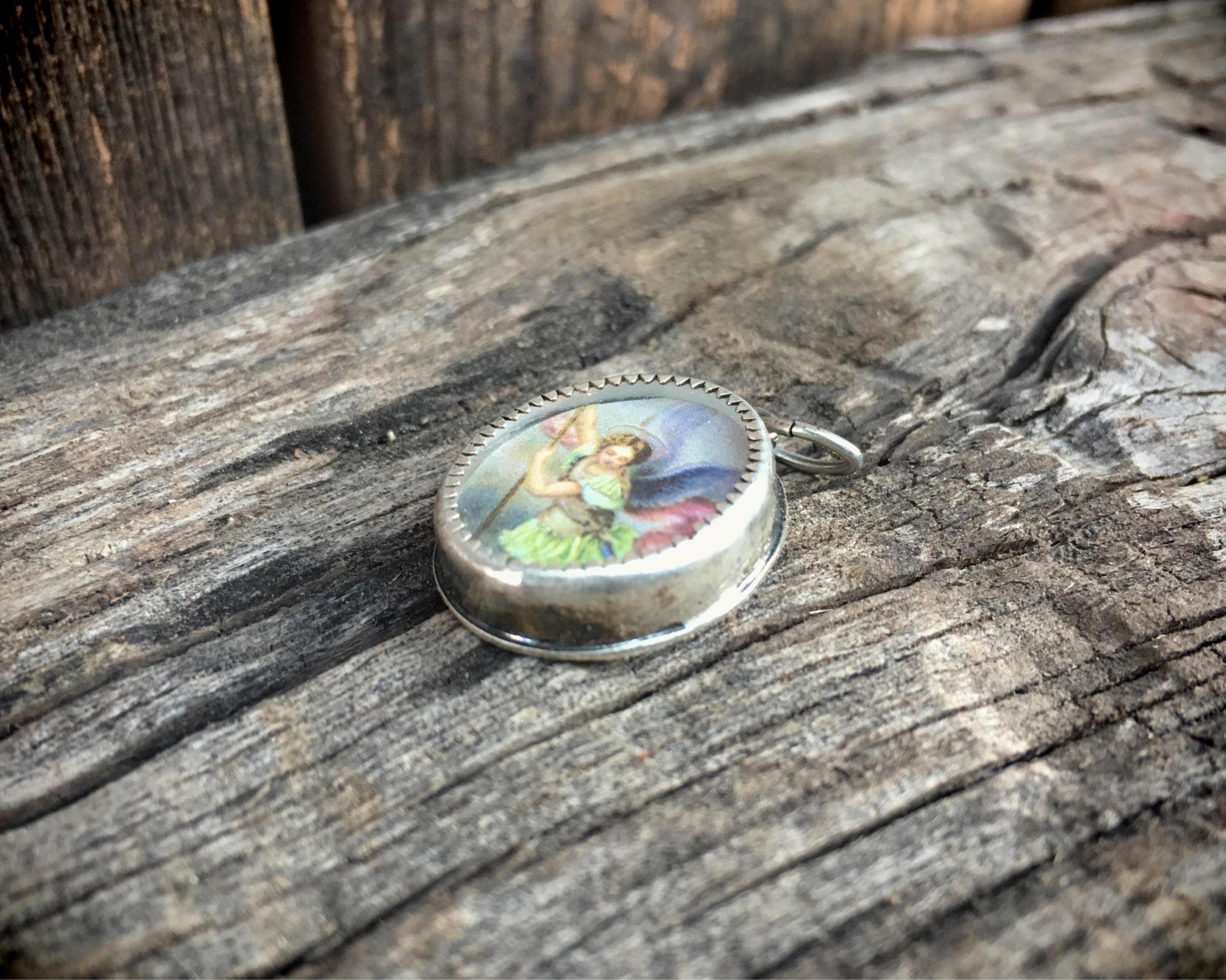 Archangel Michael Encased in Silver with Glass Reliquary Pendant