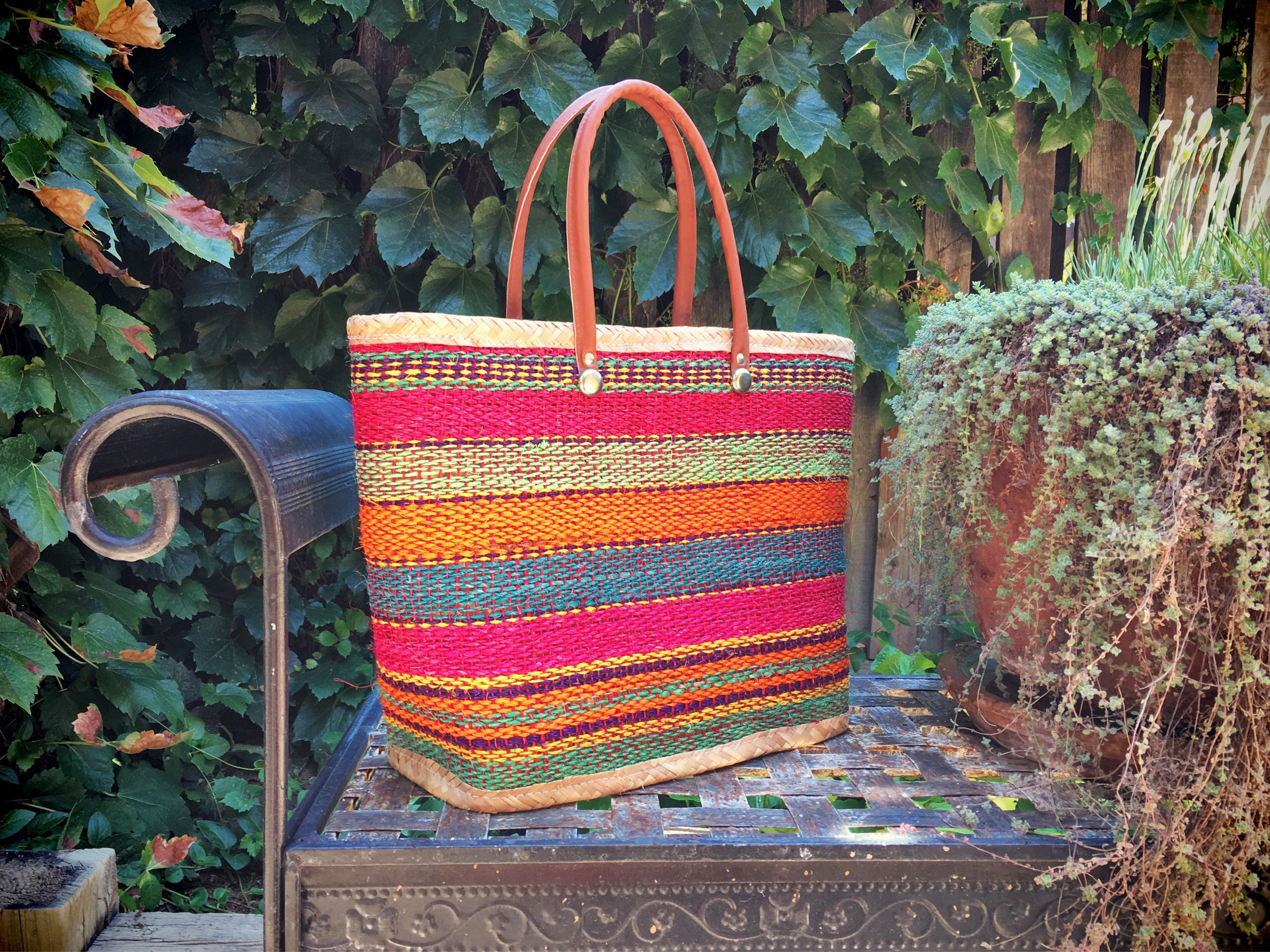 Vintage multi color woven straw tote bag with leather handles beach