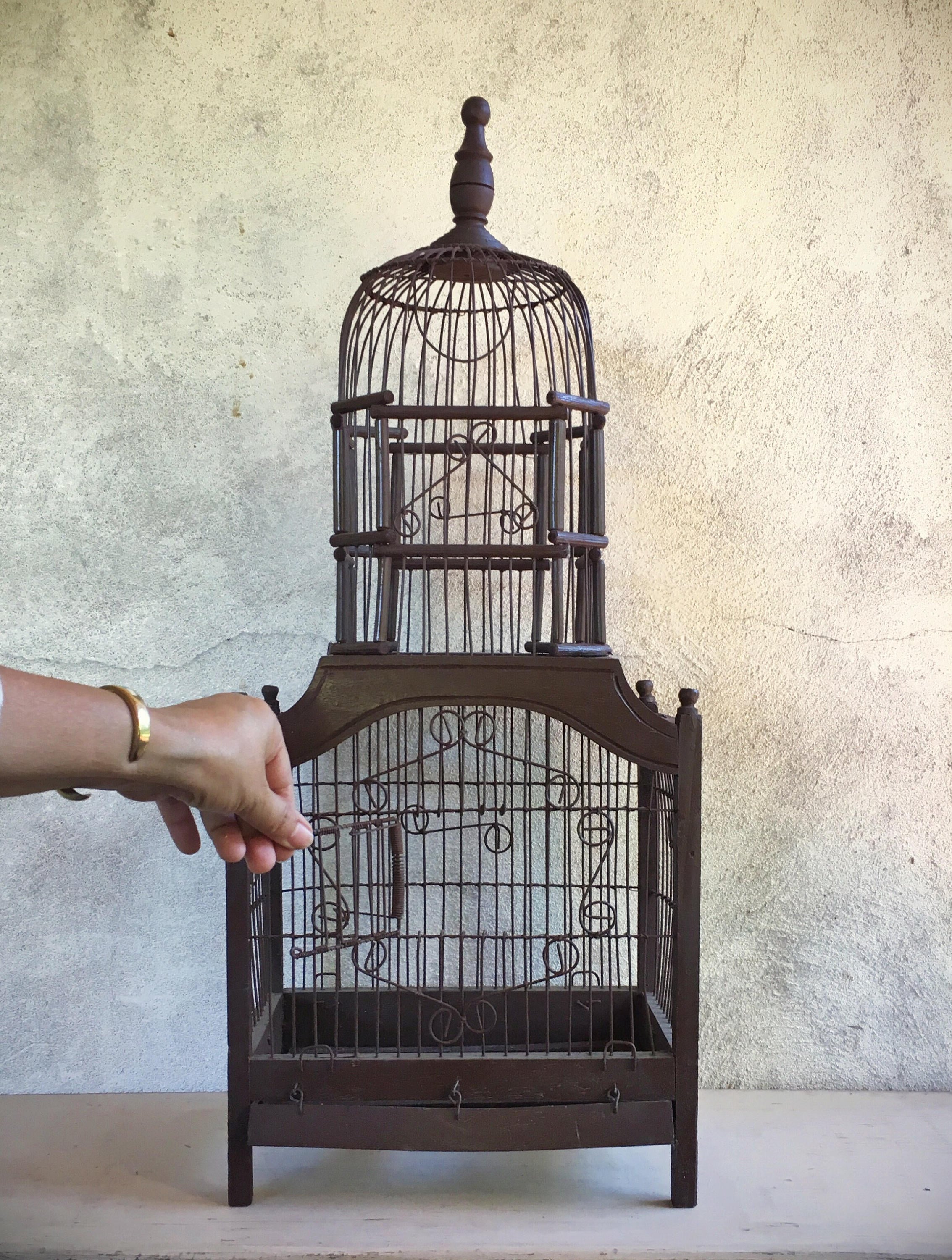 Ornate wooden bird cage