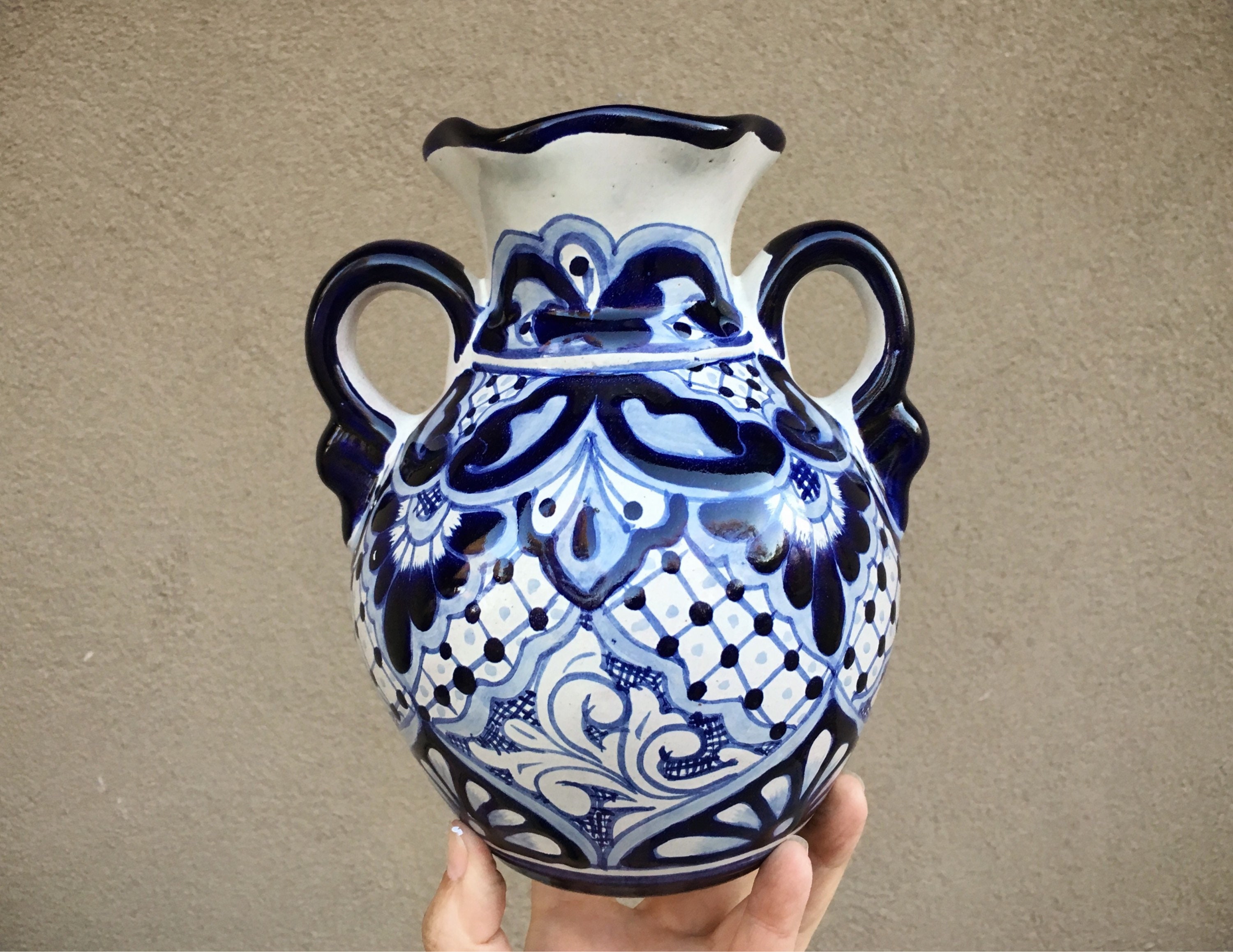 blue pottery with white figures
