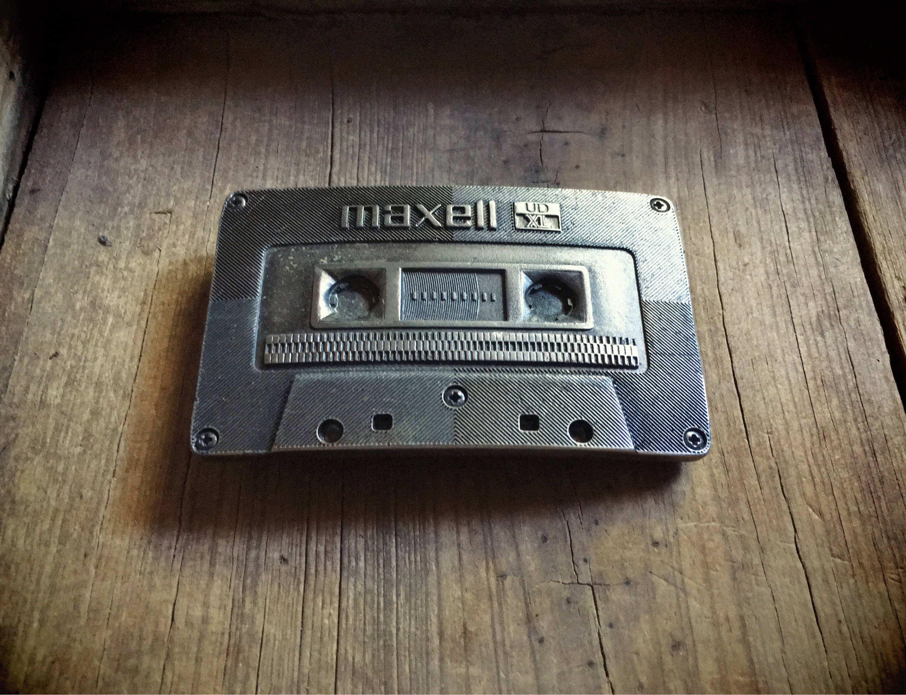 Vintage Maxell cassette tape belt buckle in silver tone metal, 1970s