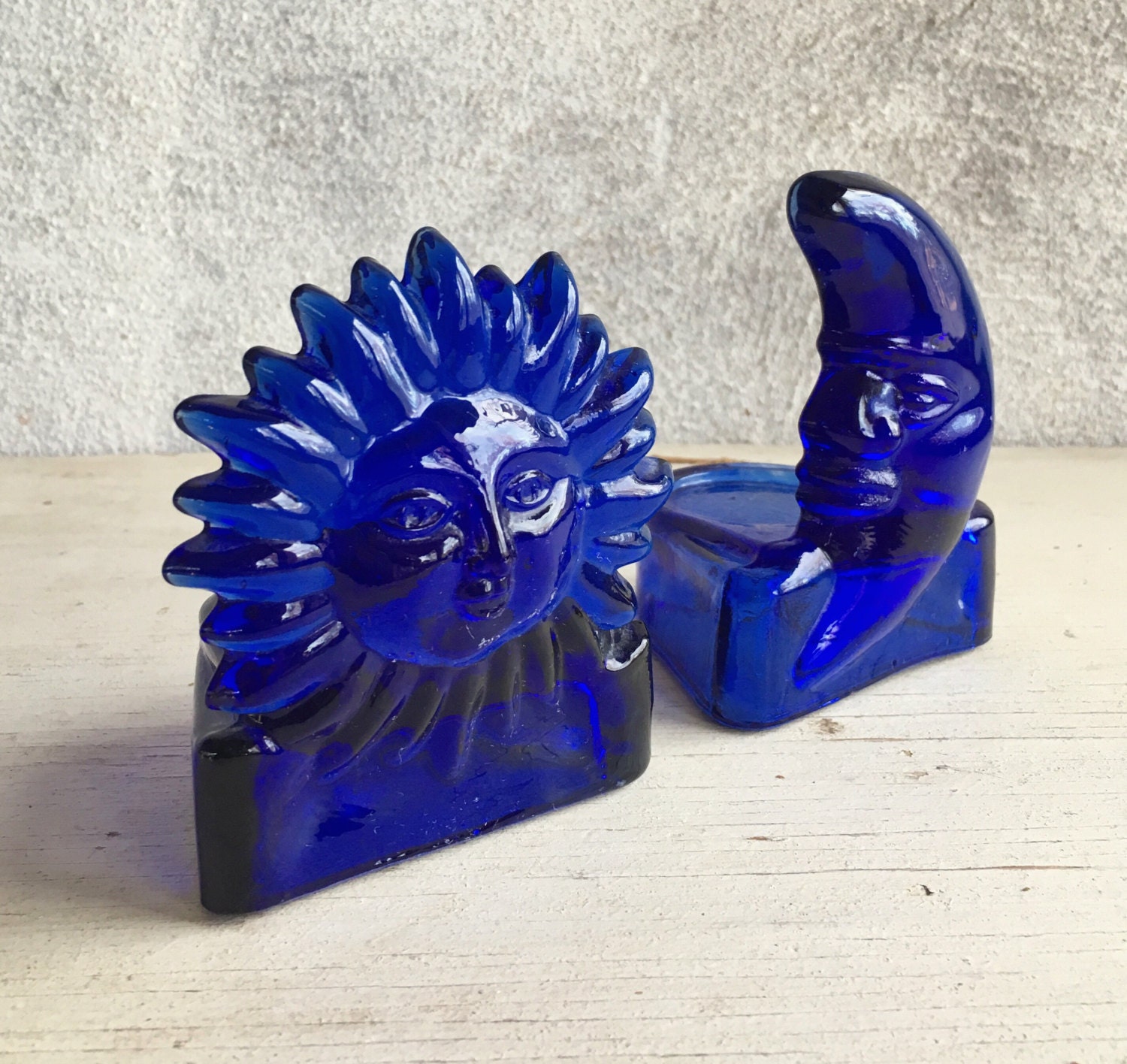 Pair of vintage bohemian cobalt blue pressed glass sun moon tealight