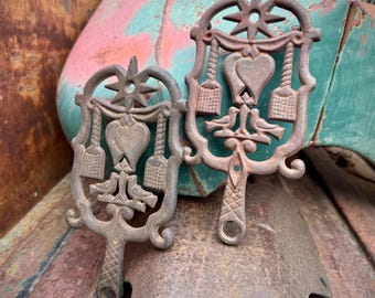Two Vintage Cast Iron Trivets Metal Hotplates, Wilton Hearts Doves Brooms