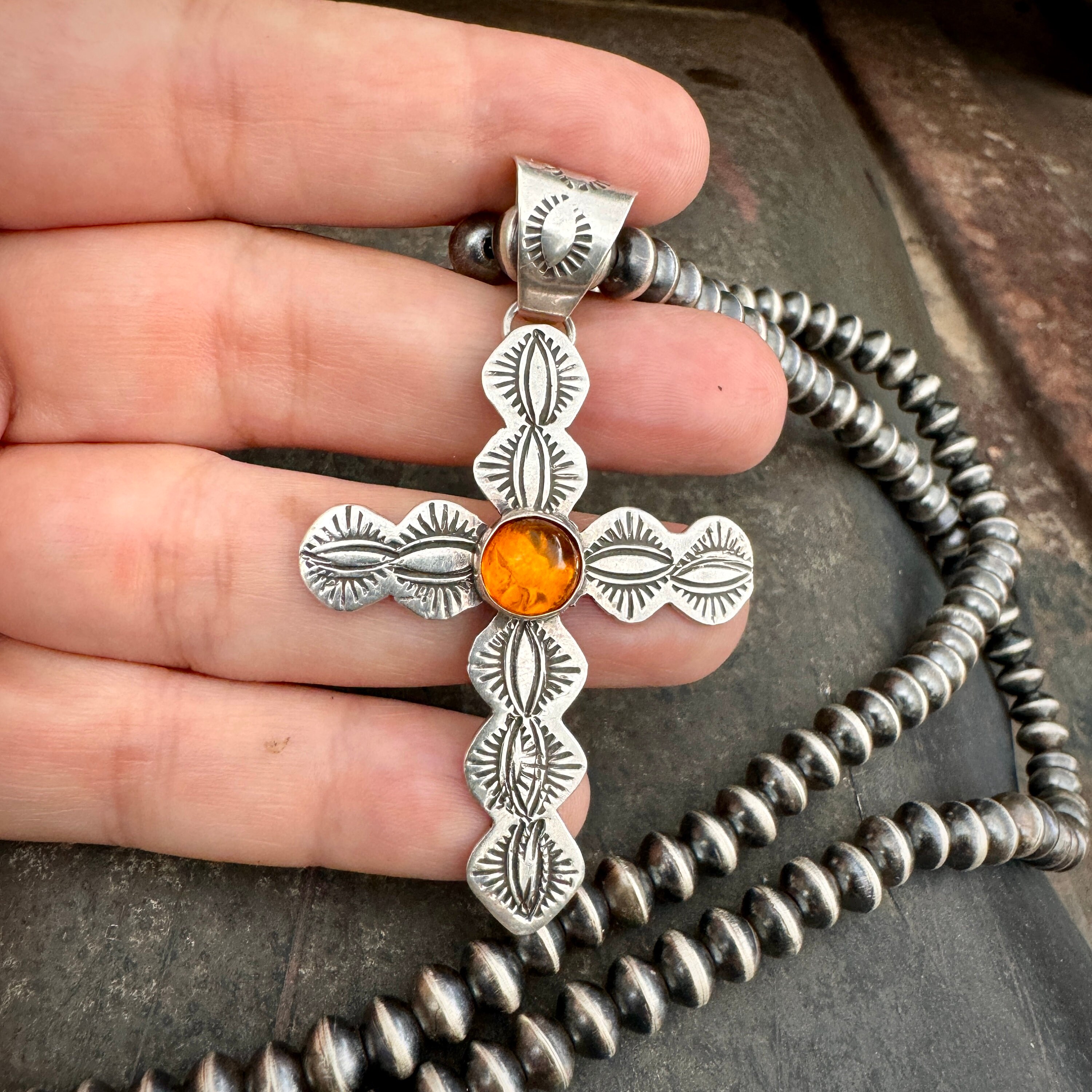 Amber cross pendant deals