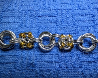 Captured Mobius and Mobius flower silver and gold bracelet