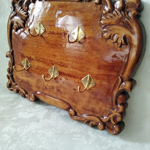 Carved wooden key holder