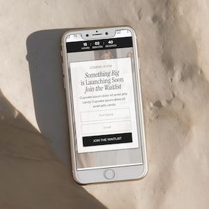 May include: A white smartphone displays a webpage with the text "Something Big is Launching Soon Join the Waitlist." The screen also shows fields for "First Name" and "Email," with a "Join the Waitlist" button. A timer shows 15 hours, 2 minutes, and 40 seconds.