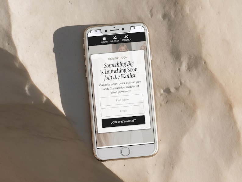 May include: A white smartphone displays a webpage with the text "Something Big is Launching Soon Join the Waitlist." The screen also shows fields for "First Name" and "Email," with a "Join the Waitlist" button. A timer shows 15 hours, 2 minutes, and 40 seconds.