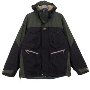 May include: A hooded, multi-pocket jacket in shades of black and olive green. The jacket features a full-length zipper, a high collar, and the "HH" logo. The jacket has a durable, weather-resistant design, suitable for outdoor activities.