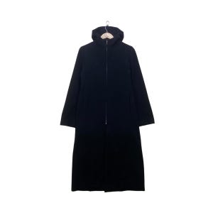 May include: A long, black hooded coat with a full-length zip. The coat is suspended on a wooden hanger against a white backdrop. The design features long sleeves and a tailored fit, suitable for outerwear, with a length that extends to the ankles.