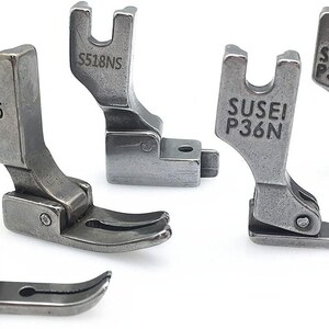 May include: Five silver sewing machine presser feet with different markings. The feet are labelled "P363", "P35", "S518NS", "Susei P36N", and "Susei P36LN".