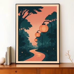 May include: A framed art print featuring a stylized illustration of a path winding through a forest at dusk. The artwork showcases orange lanterns illuminating the path, with a gradient sky and dark green trees. The print is in a black frame.