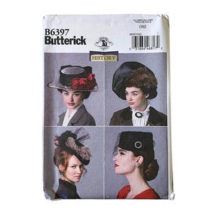 May include: A Butterick B6397 sewing pattern envelope featuring four distinct hat designs labeled A, B, C, and D. The cover displays photographs of individuals wearing these hats, which include various styles with netting, floral accents, and structured brims.