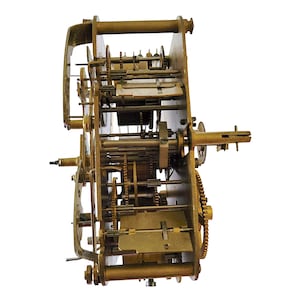 May include: A detailed view of a vintage clock mechanism, showcasing intricate brass gears, levers, and plates. The clock's internal workings are visible, highlighting the complexity of its design. The gears are various sizes and shapes.