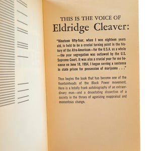 May include: Open book pages with text. The title reads "THIS IS THE VOICE OF Eldridge Cleaver:". The text discusses a turning point in the history of the Afro-American and the author's experience in prison.