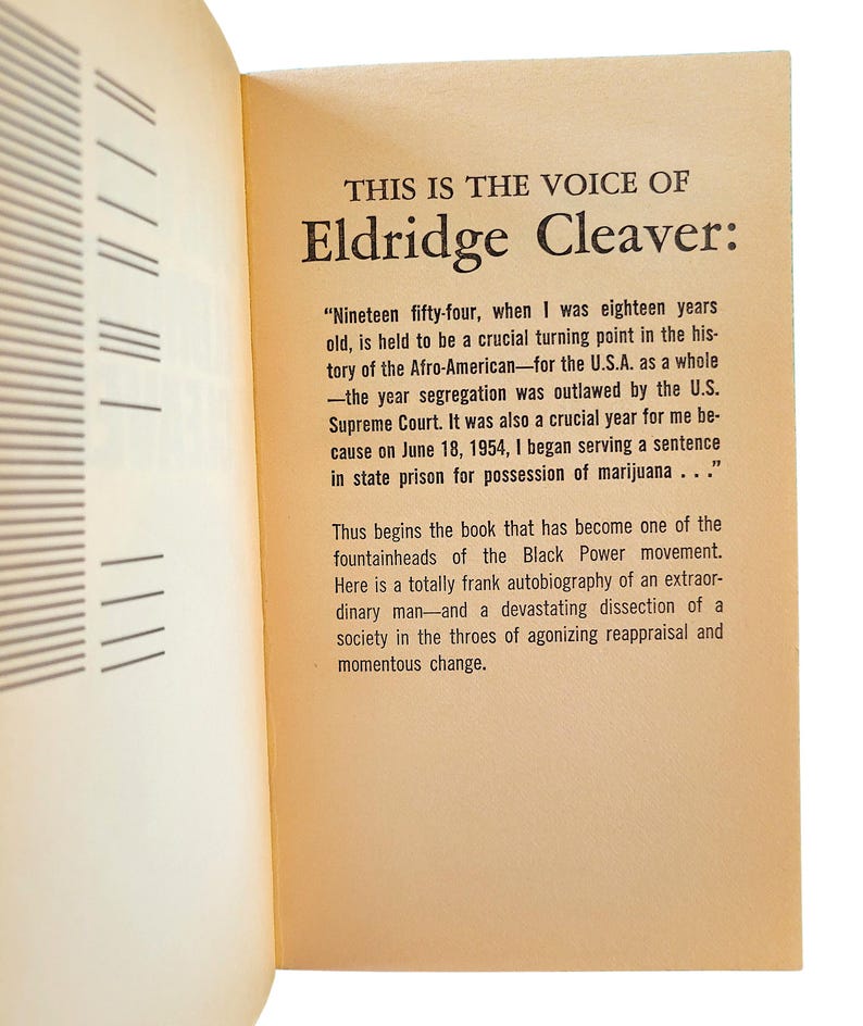 May include: Open book pages with text. The title reads "THIS IS THE VOICE OF Eldridge Cleaver:". The text discusses a turning point in the history of the Afro-American and the author's experience in prison.