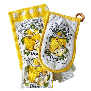 May include: A yellow and white checkered kitchen towel and a quilted oven mitt with a yellow trim and a wooden hanging ring. Both items feature a graphic print of yellow pears inside a glass jar with the text Pear printed below the jar.