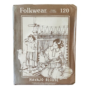 May include: A brown paper sewing pattern envelope titled Folkwear 120 Navajo Blouse. The front features a line drawing of a person weaving at a loom, another person standing nearby with a small goat, and text including Patterns for 2 Views.