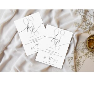 May include: Two white wedding invitations with a gray and black design. The invitations feature the date "09.26" and the text "K+L" in a script font. The invitations also include the text "We're so in love!" and "We're getting married!"