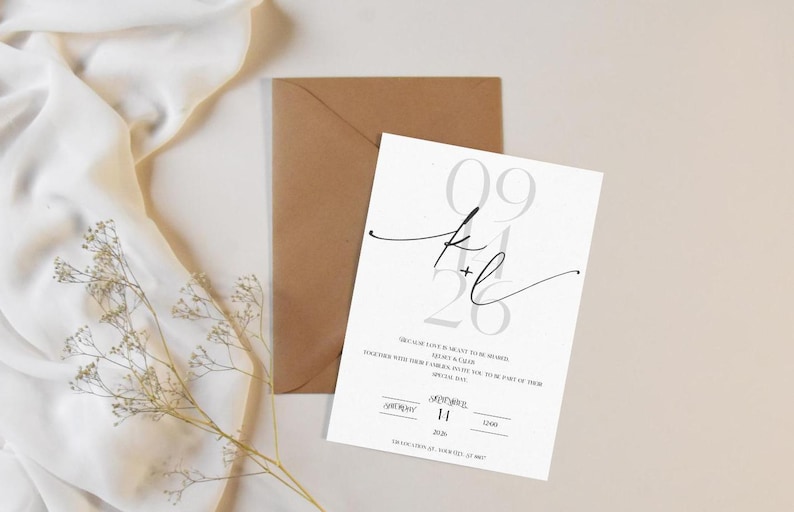 May include: A white wedding invitation with black calligraphy and gray numbers. The invitation reads "We are so love to invite you to celebrate our wedding. Please join us for a perfect party for some part of their special day." The date is September 11, 2026.