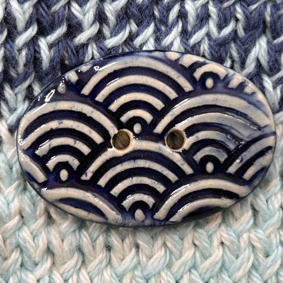 Large Oval Blue Wave Button