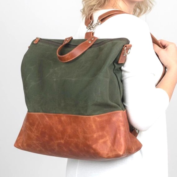 black leather fold over backpack Small Slide Lock Nike Heritage Backpack (23L). ClearanceAug2026 day use as a size:11