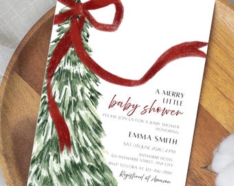 May include: A white rectangular baby shower invitation card featuring a watercolor green pine tree adorned with a red ribbon. The text reads: A MERRY LITTLE baby shower, PLEASE JOIN US FOR A BABY SHOWER HONORING EMMA SMITH, SAT | 05 JUNE 2026 | 2 PM, ANYWHERE HOTEL, 123 ANYWHERE STREET, ANY CITY, RSVP TO LORA AT 123-456-7890, Registered at Amazon.