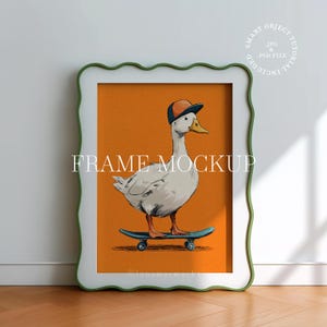 May include: A framed print featuring a whimsical illustration of a duck wearing a baseball cap and riding a skateboard. The artwork is set against an orange background and framed in a white frame with a green wavy edge. The text "FRAME MOCKUP" is visible.