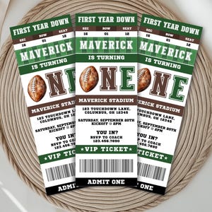 May include: Three green, brown, and white VIP tickets for a Maverick event. The tickets read "First Year Down" and "Maverick is Turning One." Each ticket includes a football graphic and event details.