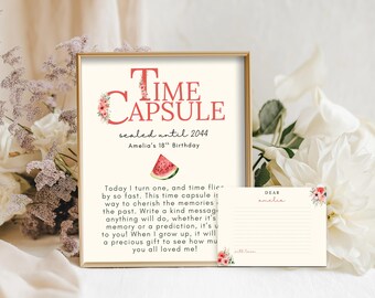 Puede incluir: Un letrero enmarcado de "Time Capsule" con texto y una ilustración de sandía, sellado hasta 2044. Incluye una tarjeta a juego. El letrero está decorado con detalles florales y está diseñado para el 18 cumpleaños de Amelia.
