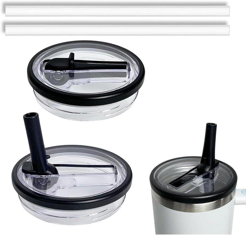May include: Clear plastic tumbler lids with black detailing and a black straw. The lids feature a black rim and a sliding mechanism for opening and closing the drinking hole. Two white plastic straws are also included.