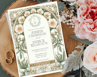 May include: A wedding invitation with a floral design featuring white flowers and green leaves. The invitation is for Jennifer Chamberlain and Patrick Wellington, and it states the wedding will take place on Saturday, May 23rd at 2 o'clock in the afternoon at The Queen Plaza in Denver, Colorado.