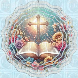 May include: A layered, circular decoration featuring a cross radiating light above an open book. The design is surrounded by colorful flowers, including roses and sunflowers, in shades of pink, blue, and yellow. The background is a light blue with a repeating pattern.