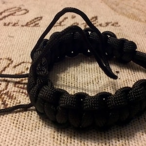 Paracord Smartphone-Armband / Ständer