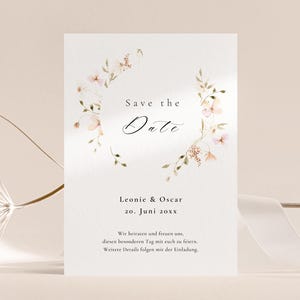 Carte de sauvegarde de date de mariage florale | Modèle Canva élégant avec couronne de fleurs sauvages | Carte de mariage personnalisable à concevoir soi-même