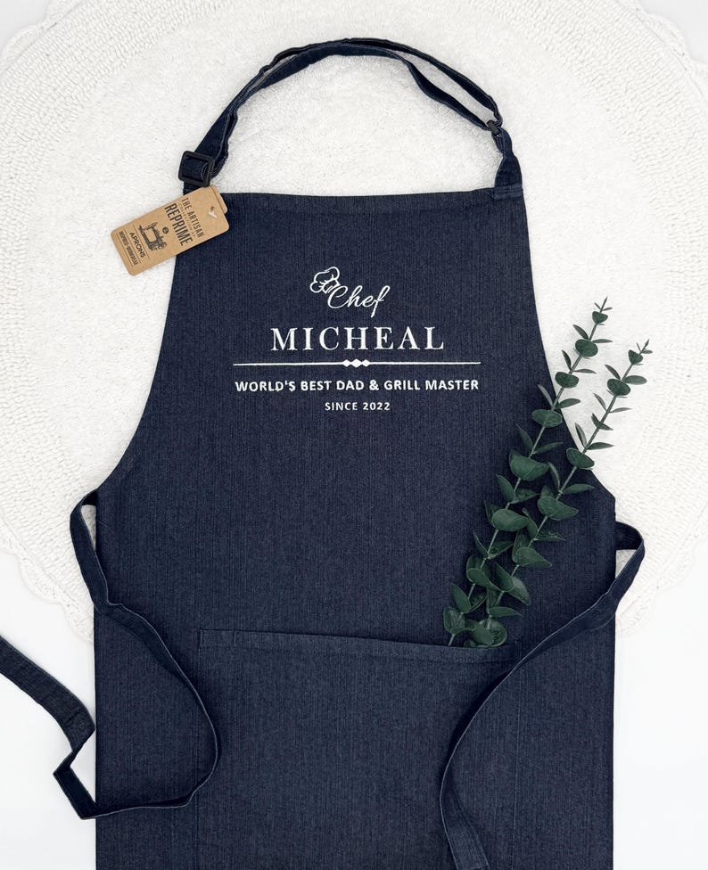 a personalized apron with a plant on top of it